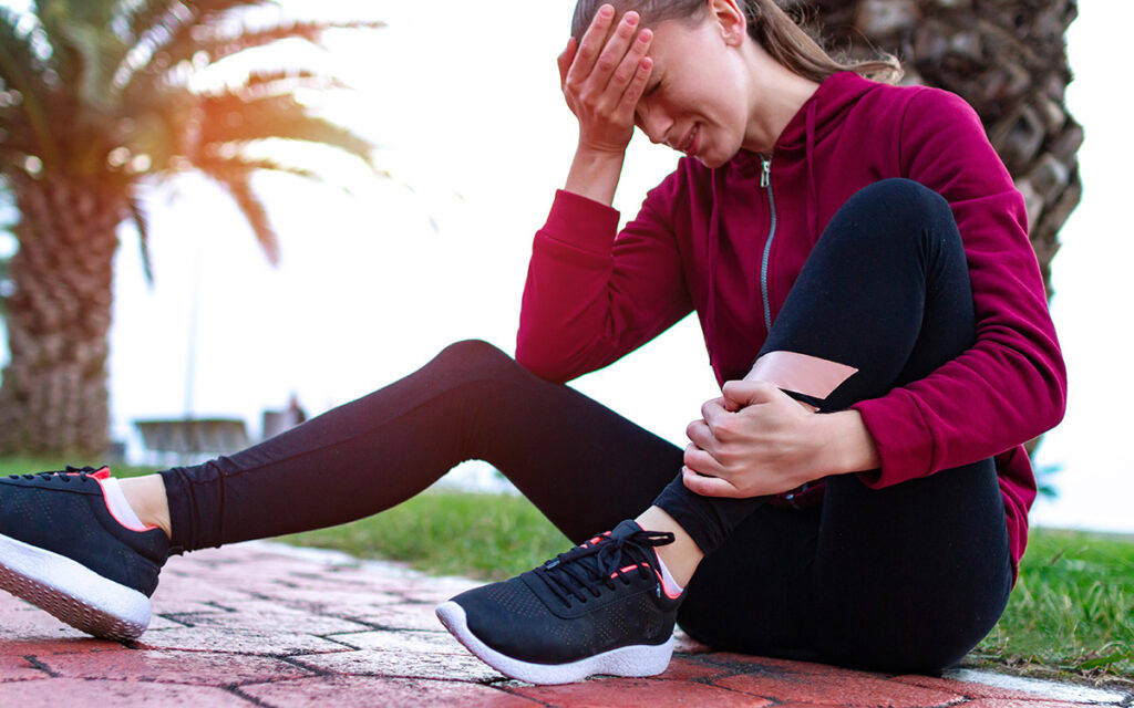 woman on the floor with injury